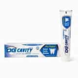 DG Cavity Defense Toothpaste 75g with tube and box on a white background.