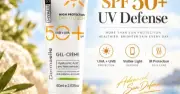 أنبوب كريم واقي من الشمس SPF 50+ من ديرمايل على صخرة بجانب البحر مع سماء مشمسة.